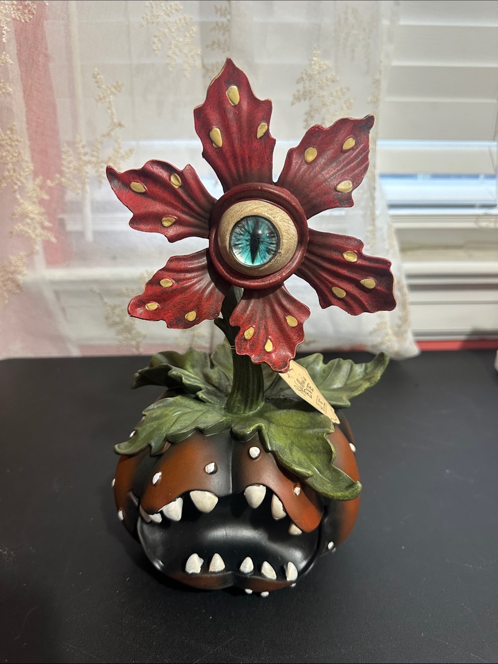 Hallow eve pumpkin eyeball plant decor